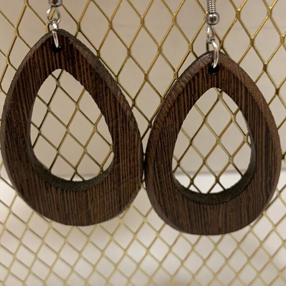 Four pair of earrings. Two are solid wood & walnut color have metal trim detail - Picture 5 of 11